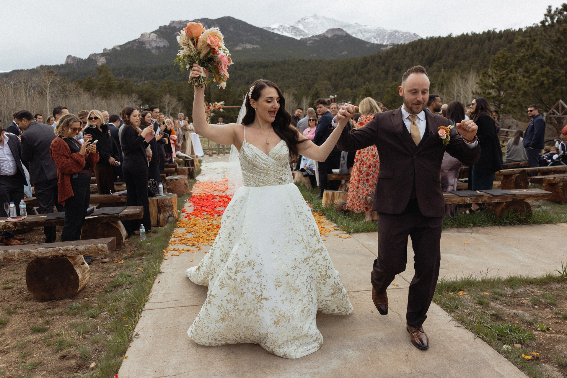The joy of being married is clear on the couple's faces after their wedding at Wild Basin Lodge near Estes Park, Colorado