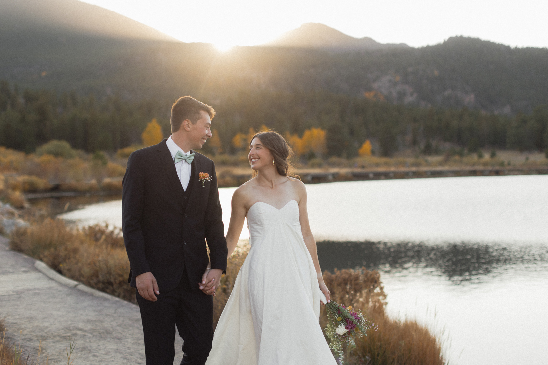 Couple smiling at each other on their wedding day in Rocky Mountain National Park