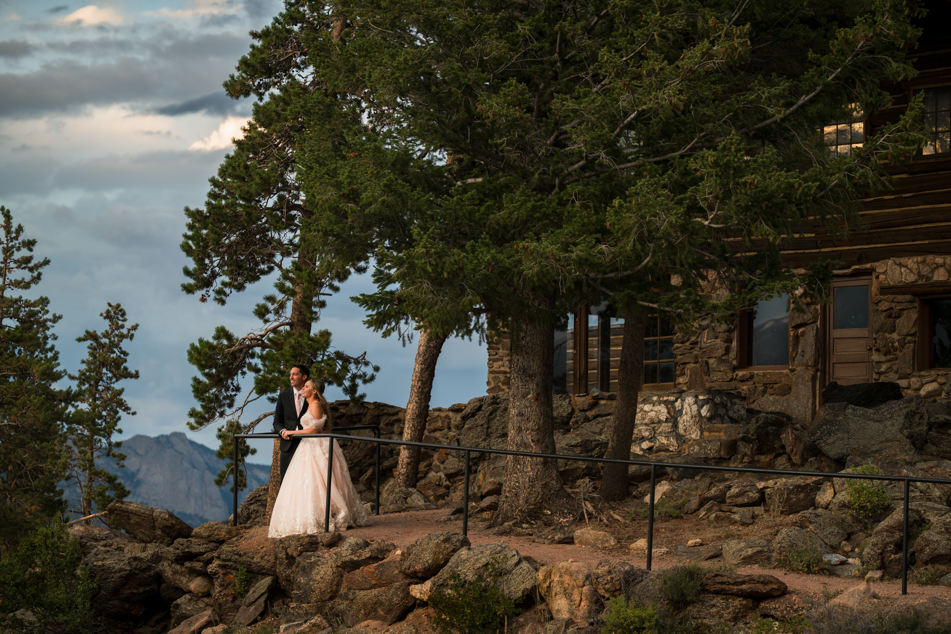 A couple enjoying the incredible views from Mountainside Lodge at YMCA of the Rockies Estes Park