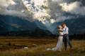 A couple embraces on their wedding day in Rocky Mountain National Park