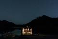 A wedding couple under the night stars in Rocky Mountain National Park, Colorado